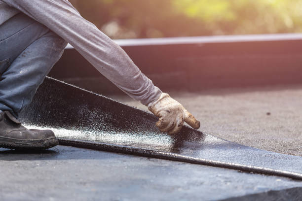 Professional Waterproofing technician working in Montague, MI